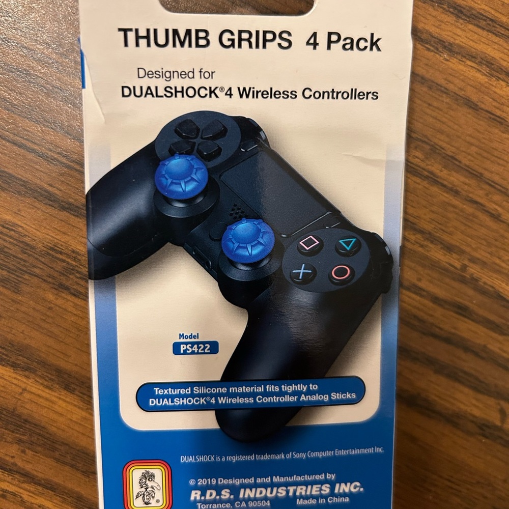 4 pack of thumb grips for PlayStation controllers.
